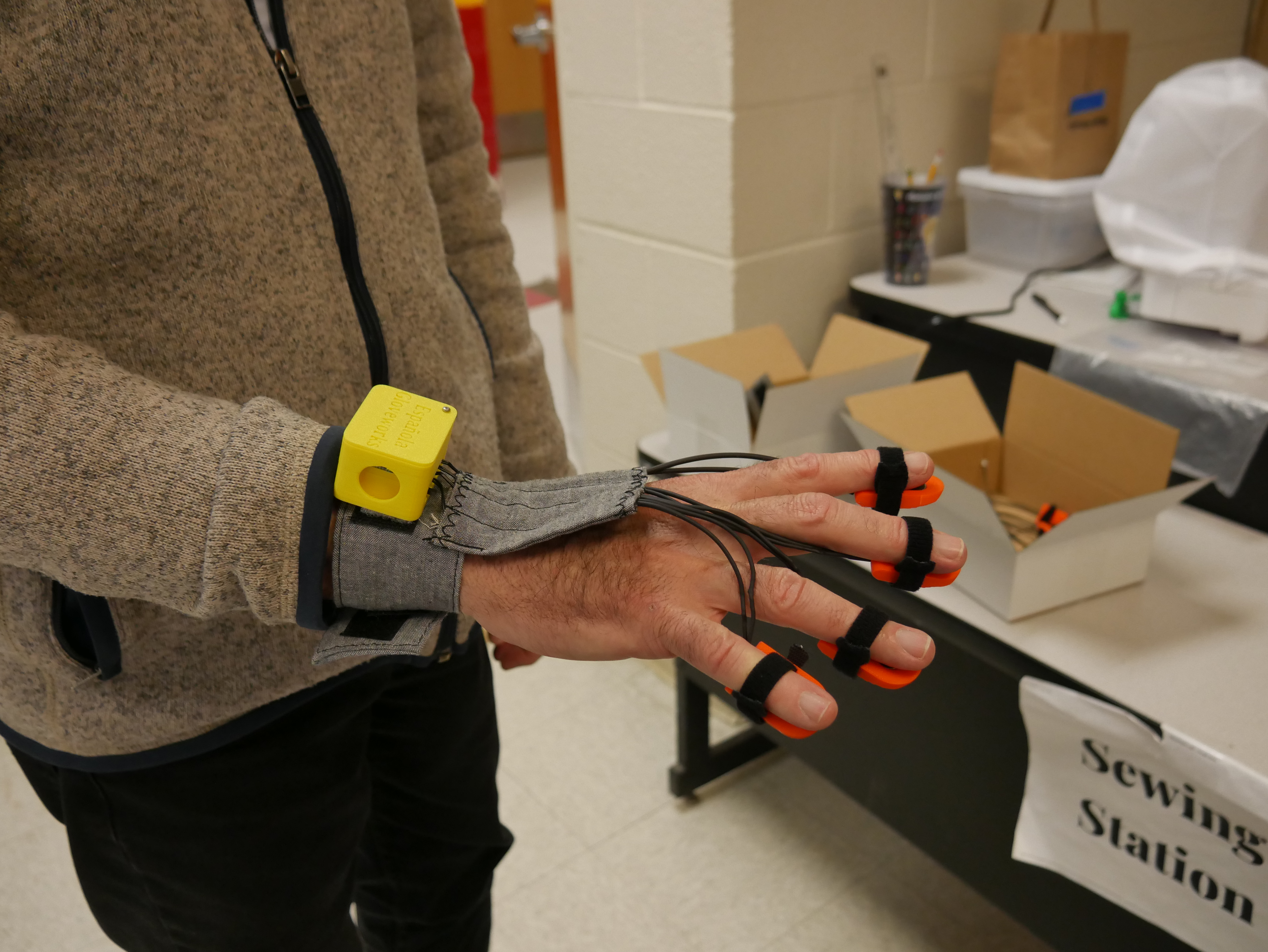 Steve Cox demonstrates the new design of the glove