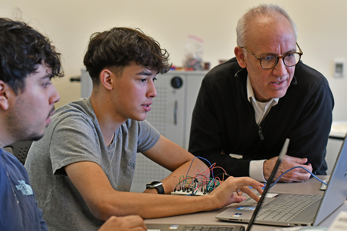 Dr. Cox and student